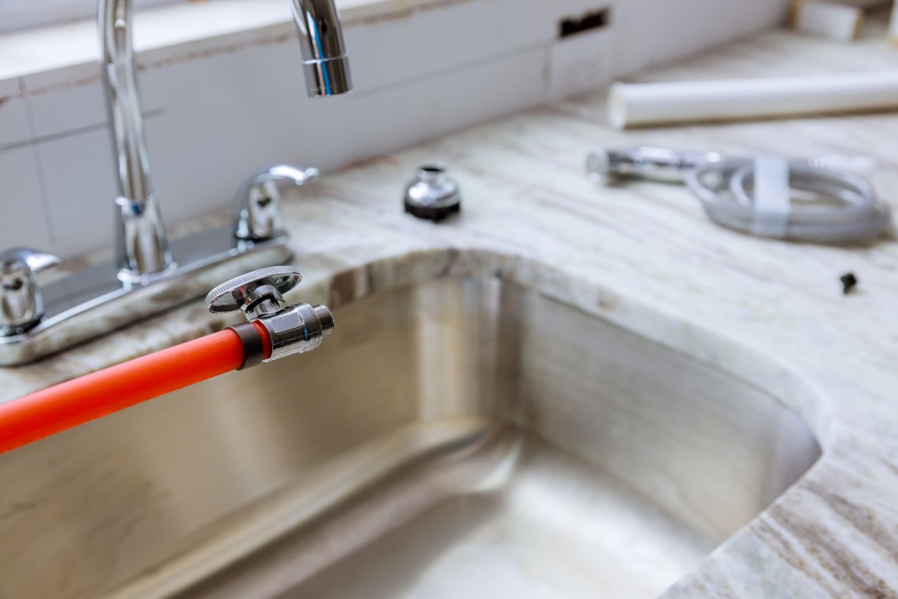 Plumbing rough-in coordinated with framing and interior construction