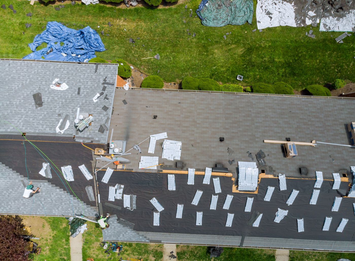Residential roof evaluated for repair and active leaks