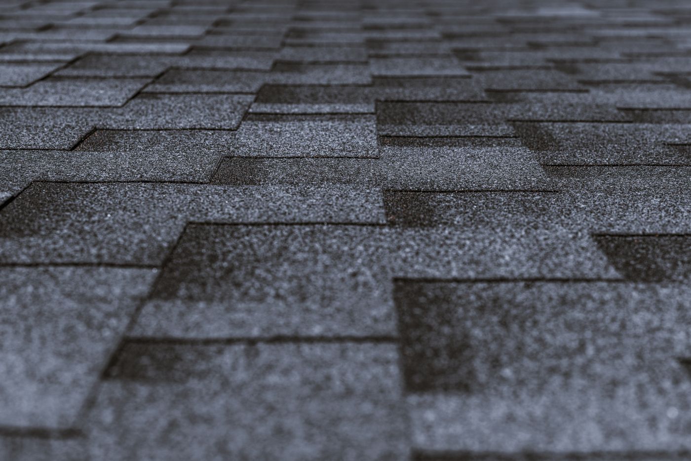 Residential roof requiring storm damage restoration